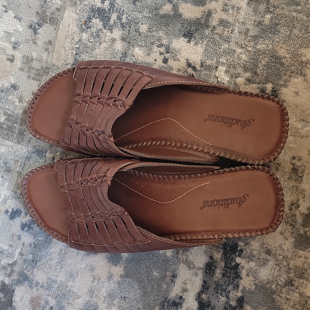 Brown sandal slip on super comfy size 11w leather uppers.